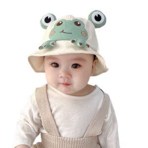 bob-baby-frog-couleur-beige Bébé-souriant-prend-la-pose-en-photo-avec-son-bob-baby-frog-couleur-beige-sur-sa-tête
