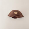Bob-couleur-marron-tête-avec-une-d'ourson-brodé-