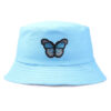 bob-papillon-brode-couleur-bleu-clair Bob-papillon-brodé-couleur-bleu-clair-sur-un-fond-blanc