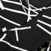 zoom-textures-et-coutures-bob-graffiti Zoom-sur-les-textures-et-la-qualité-des-coutures-du-bob-graffiti-de-couleur-noir