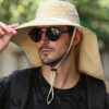 Homme-porte-un-bob-protection-intégrale-et-des-lunettes-de-soleil