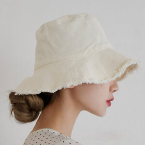 bob-chic-femme Bob-chic-beige-sur-la-tête'-d'une-femme