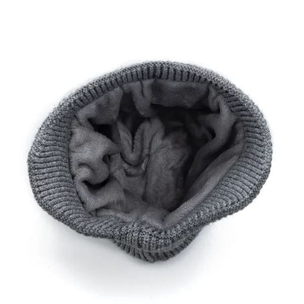 Vue intérieure d’un bonnet homme cache oreilles avec doublure polaire douce pour isolation thermique maximale